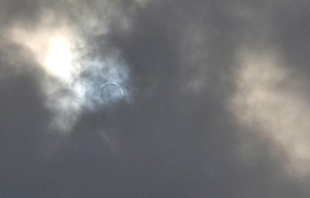 Eerie effect of the clouds and the annular eclipse.
